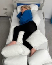 Patient on side in bed